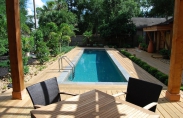 4 Lap Pool with wood decking and hand rail