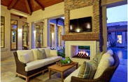 Outdoor Living Room_ Contains Fireplace and Sofas