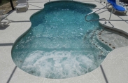 Pool with Spa Jets and Cool Concrete Decking