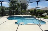 Freeform Pool with Sheer Descents and Built in Table with Bench