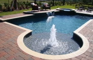 8 Signature Pool- Geometric pool with raised spa, sheer descents and bubblers