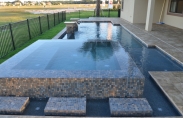 Signature Geometric Pool with Water Bowls and Spa